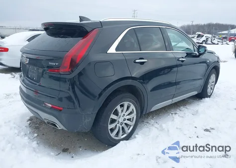 2022 Cadillac Xt4 Awd Premium Luxury from USA, damaged, VIN 1GYFZDR48NF127705
